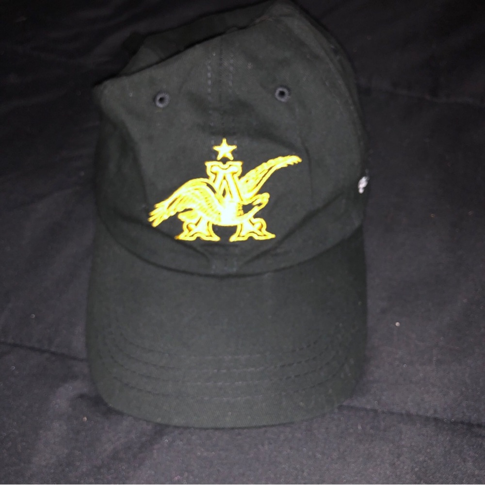 Black Baseball Cap with Gold Embroidered Crest